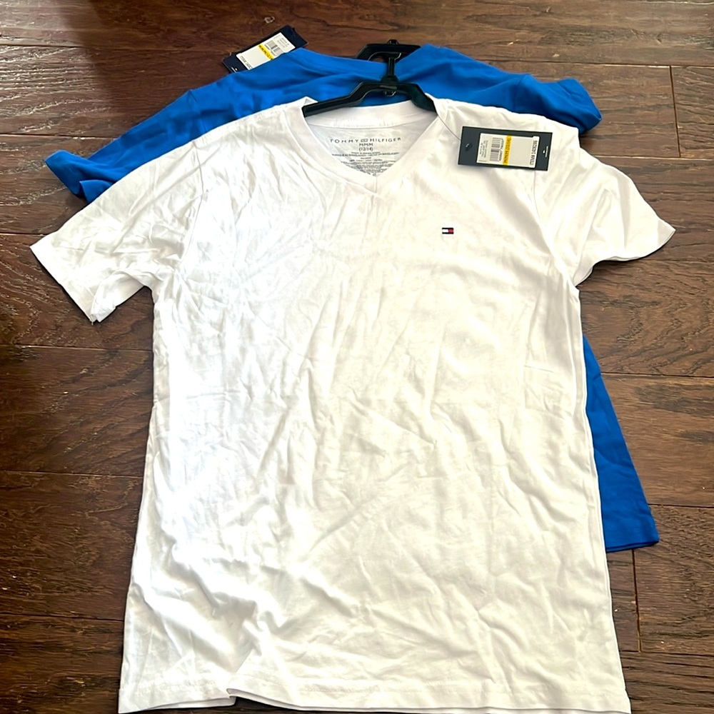 New size 12/14 2 pack shirts